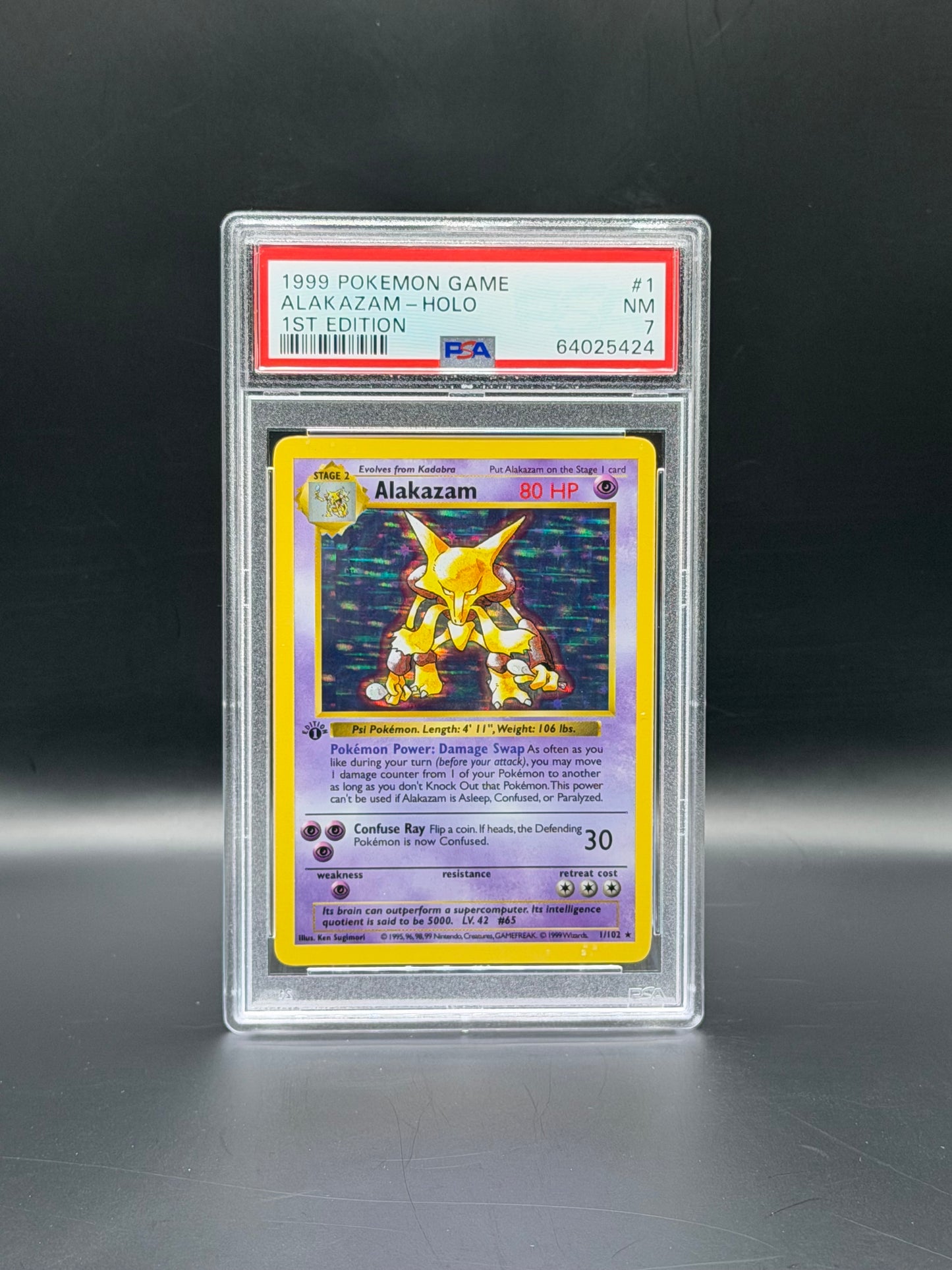 1999 Pokémon Base Set 1st Edition Alakazam Holo Rare PSA 7 Near Mint Pokémon Card WOTC